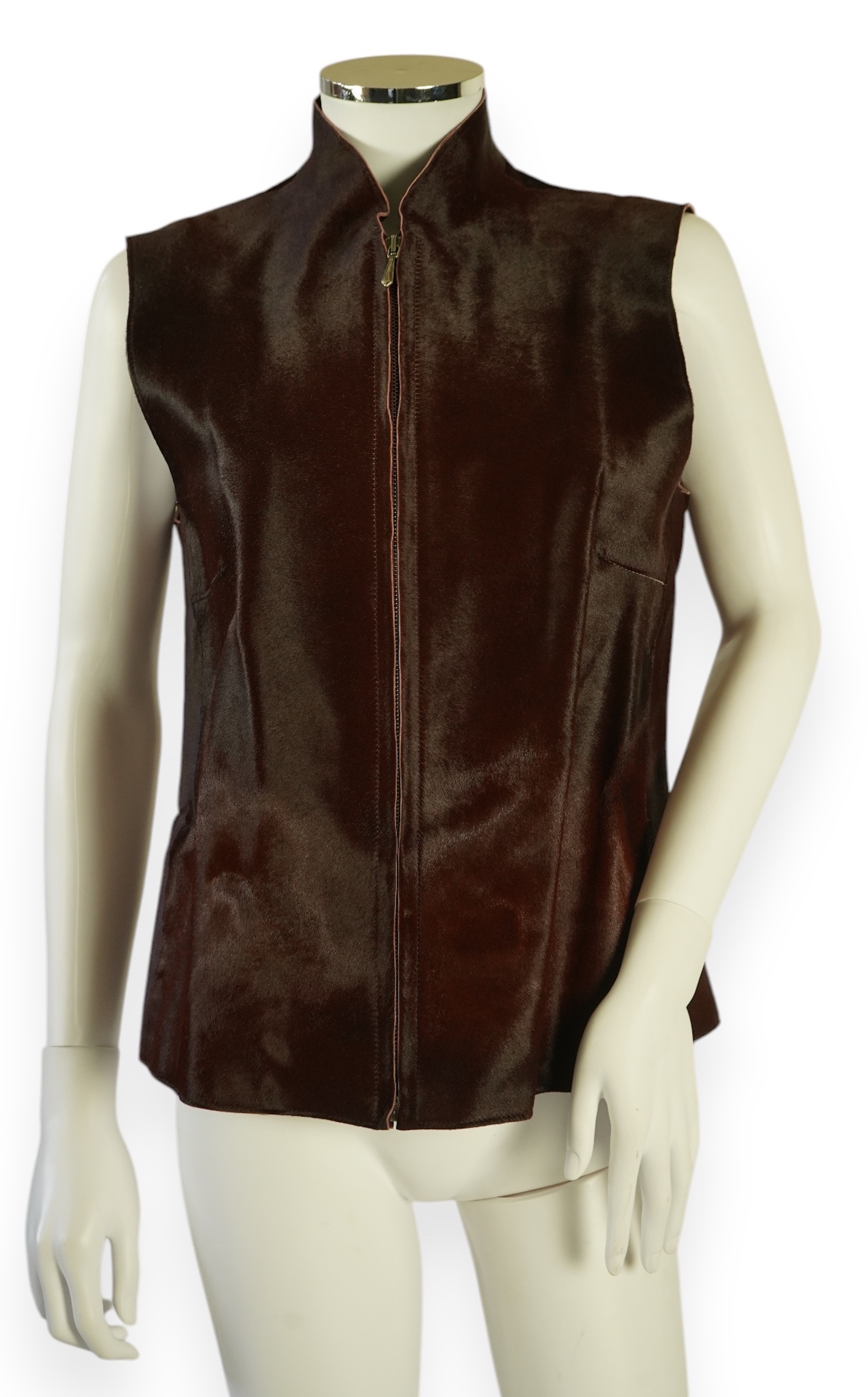 A lady's Jaeger brown ponyskin gilet with burgundy satin lining. UK 12-14